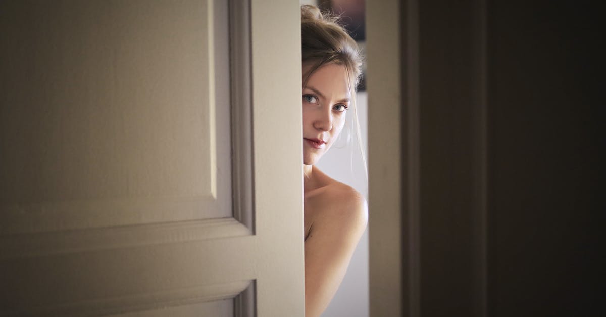 Photoshoot in Durdle Door and Lulworth Cove - Photo of Woman Behind Door