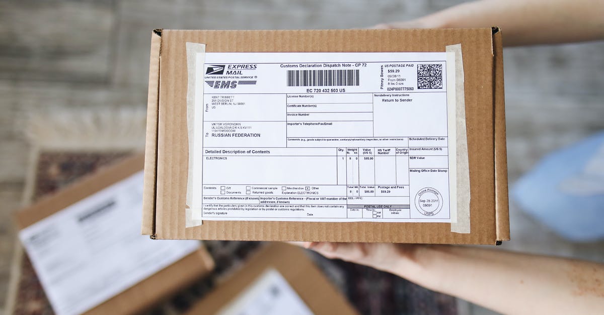 Picking up mail at the Post Office in Japan - A Brown Delivery Box with Mailing Details