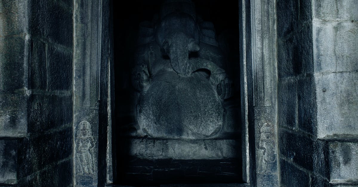 Place with well-treated elephants in Ko Samui/Chiang Mai? - Old stone sculpture of ancient god