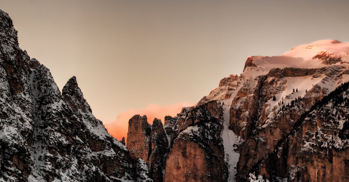 Places in the Alps by sunshine duration - Brown and Gray Snow-covered Mountains