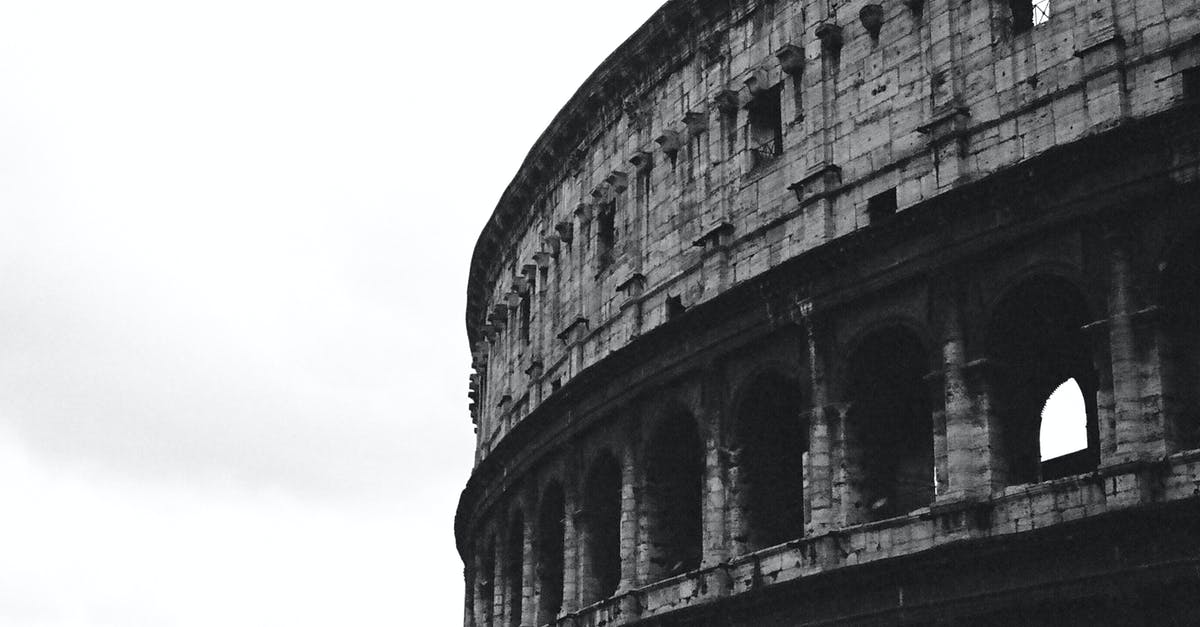 Places of interest to see while visiting Malta? [closed] - Grayscale Photo of Concrete Building