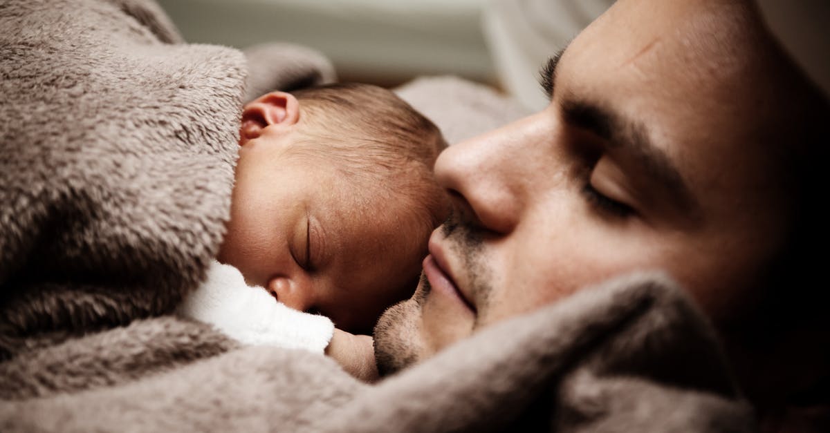 Places to seat/sleep at SFO pre-security - Sleeping Man and Baby in Close-up Photography