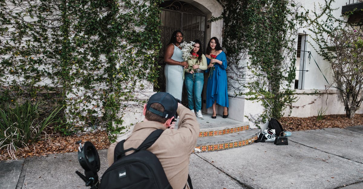 Places to take pictures of flowers in San Diego - A Man Taking Picture of the Three Women