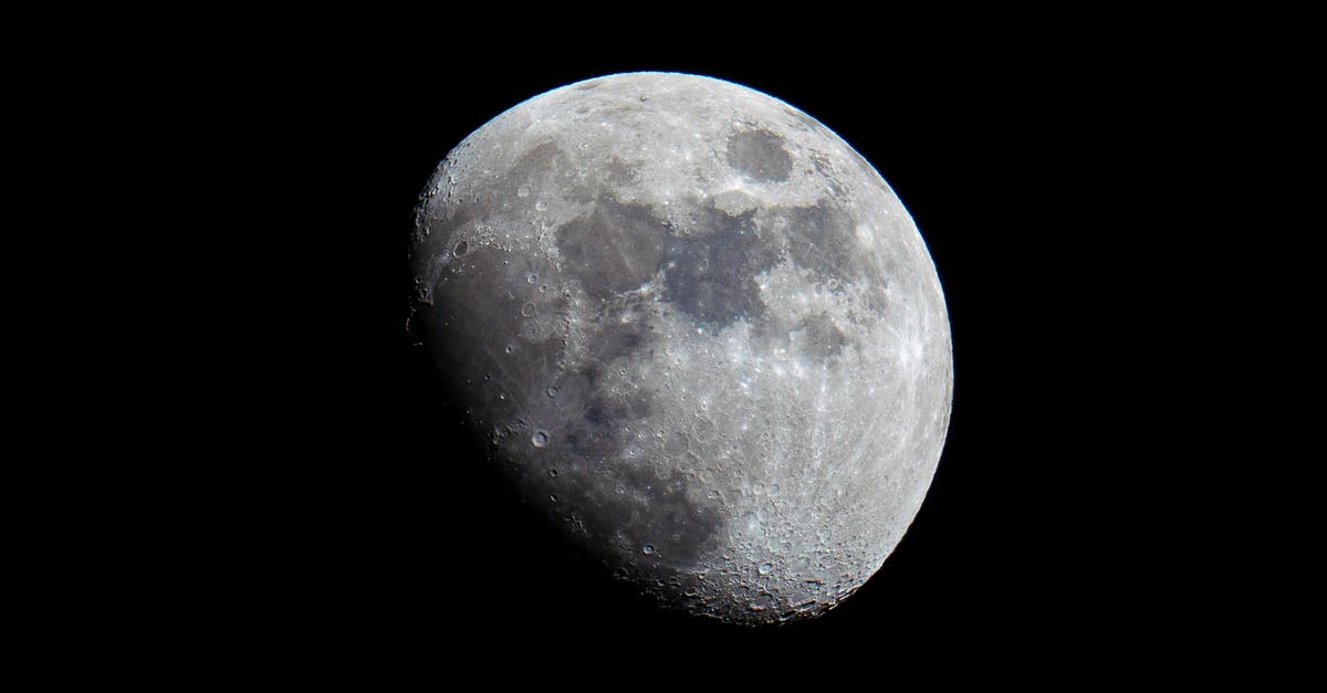 Places to visit in Granada at night [closed] - White and Gray Moon on Black Background