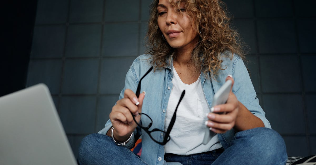 Planning French autoroute drive, aires - Photo Of Woman Holding Eyeglasses