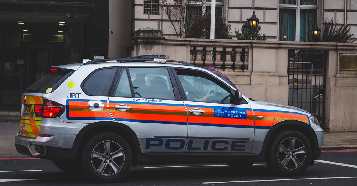 Police ride along in London - Police Car Passing by Road