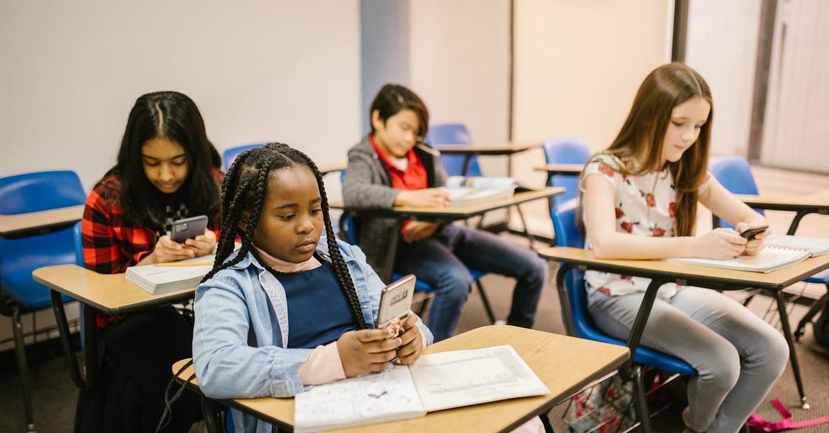 Portable Internet for Hiking? [duplicate] - Students Sitting Inside the Classroom While Using Their Smartphone