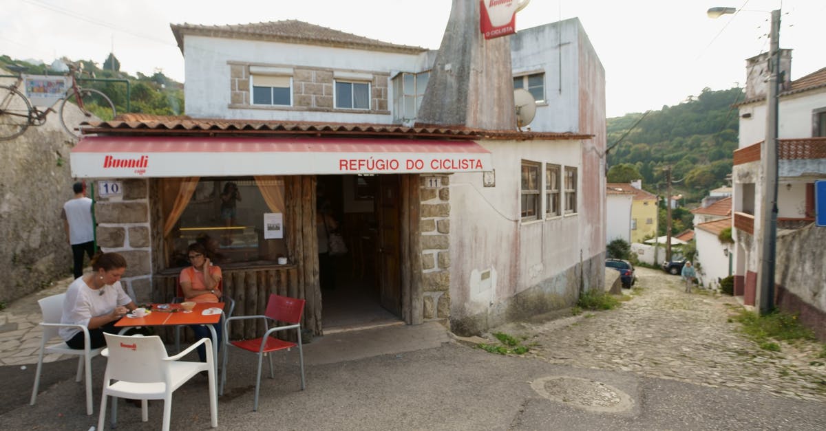 Portugal - fishing by tourist - People Sitting Beside Table