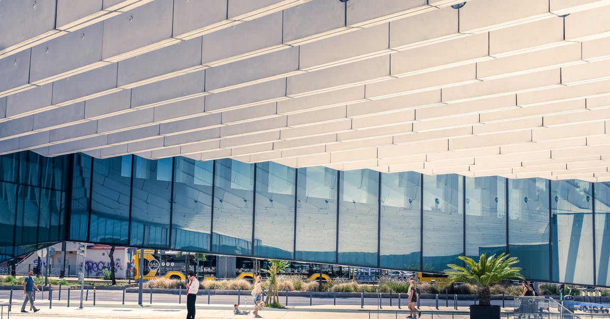 Portugal visa, business or tourism? - People Walking near the EDP Headquarters in Lisboa Portugal