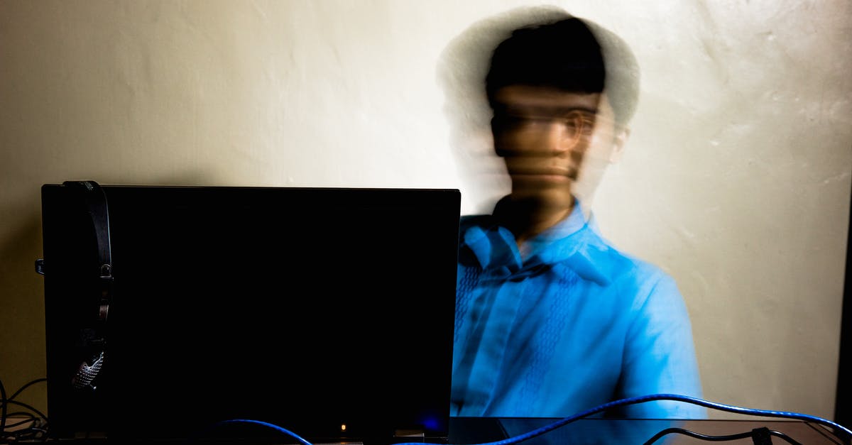 Possibilities of getting the visas processed on time - Exhausted man working on laptop in office