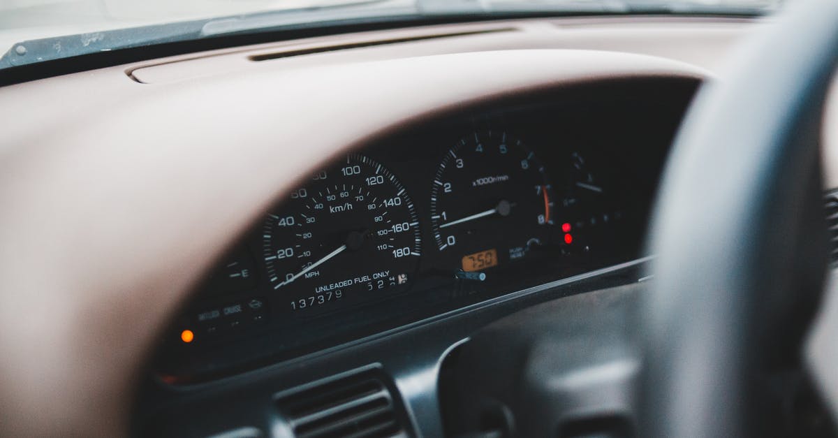 Possibility to cancel part of a trip Lufthansa and DB [closed] - Closeup of control panel of modern expensive automobile with indicators on wide dashboard in soft focus