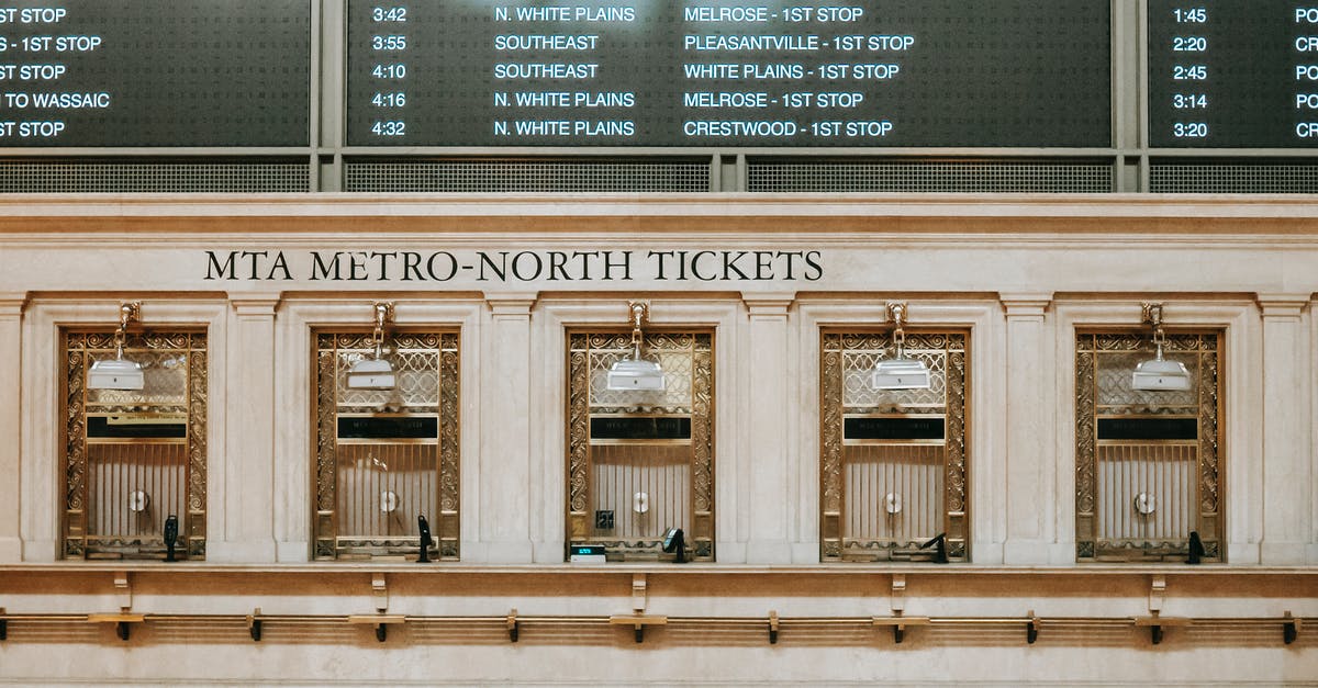 Potential check-in/boarding problems with one-way ticket to USA? - Interior of old box office with golden details under schedule in Grand Central Terminal