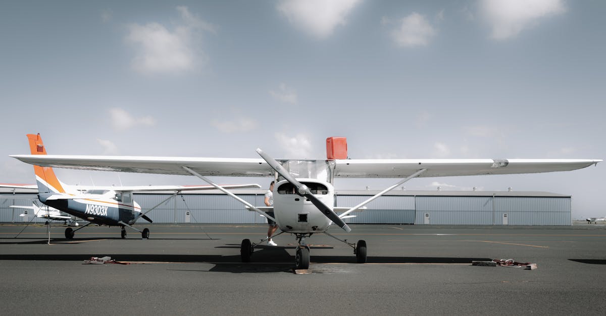 Power at landside at Budapest airport? - Modern propeller aircraft parked on aerodrome