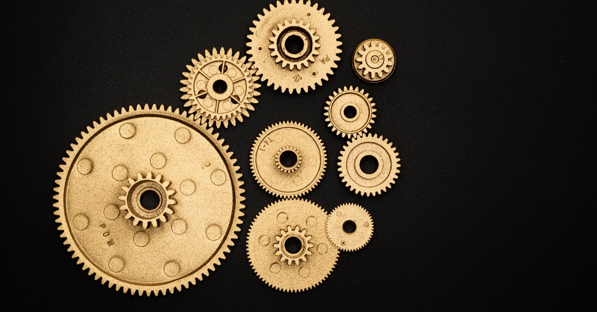 Power plugs in train repeatedly turning off - Photo of Golden Cogwheel on Black Background