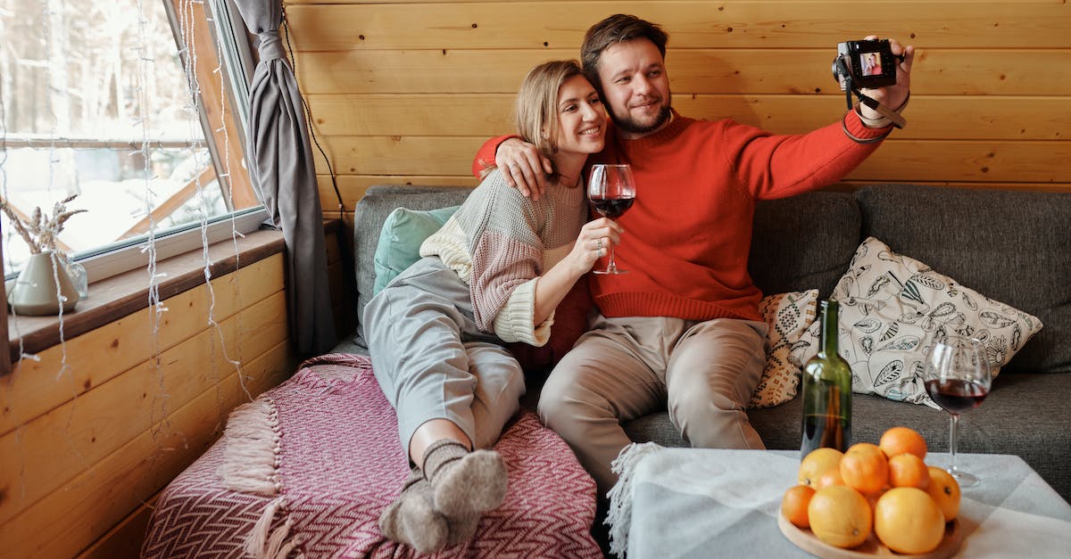 Precautions taking the Tren a las Nubes - Couple Resting in Cottage Taking Picture on Camera