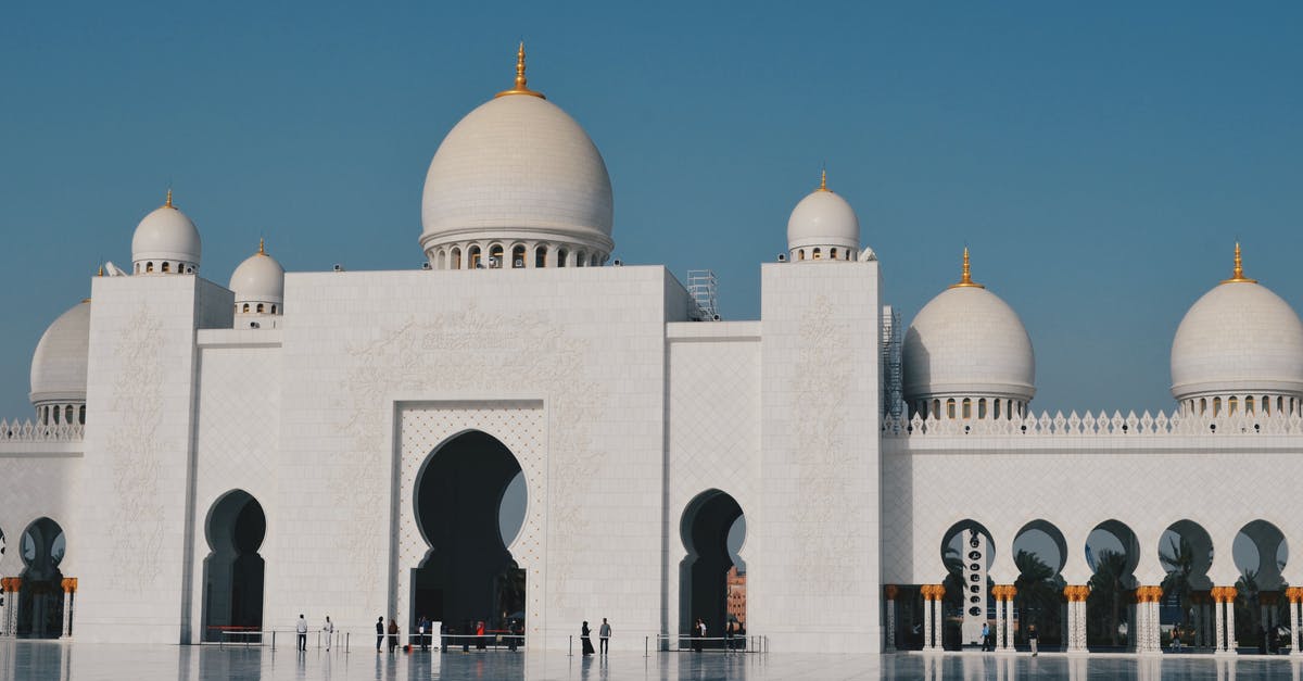 Pre-clearance in Abu Dhabi or Dublin - View of Mosque in City Against Clear Sky