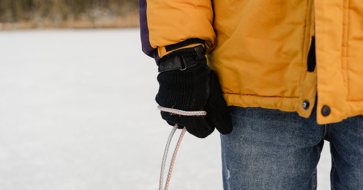 Predicting the snow line in the French Alps [closed] - Person Wearing Gloves Holding a Rope