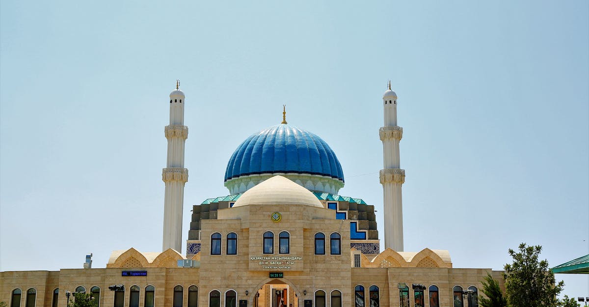 Previous travel evidence required - White and Blue Concrete Mosque