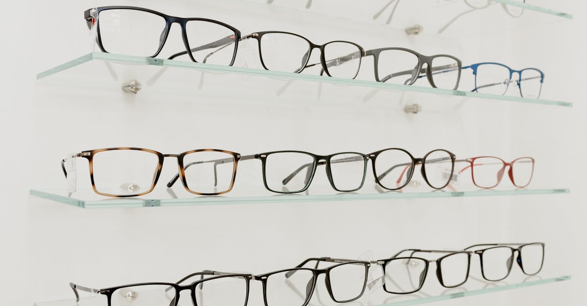 Price difference on Matrix ITA and Google Flights - Collection of eyeglasses on shelves in store