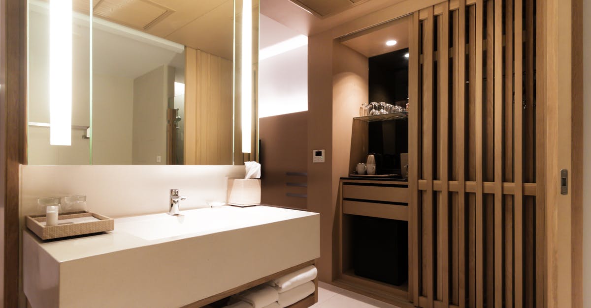 Proof of accommodation for Thailand visa on arrival - White Ceramic Sink With Mirror