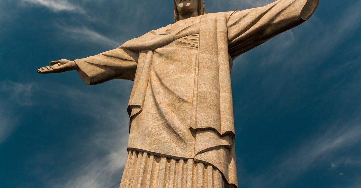 Proving onward travel on a South America tour - Low Angle Photography of Statue of Liberty Under Blue Sky