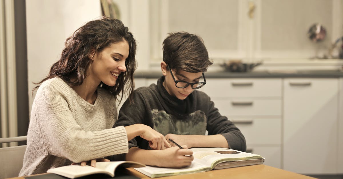 Proving sibling relationship - Elder sister and brother studying at home