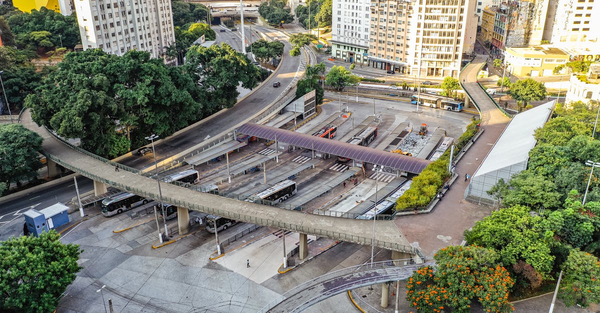 Public bus from Salta to Los Castillos - Modern asphalt road with bridge and buses