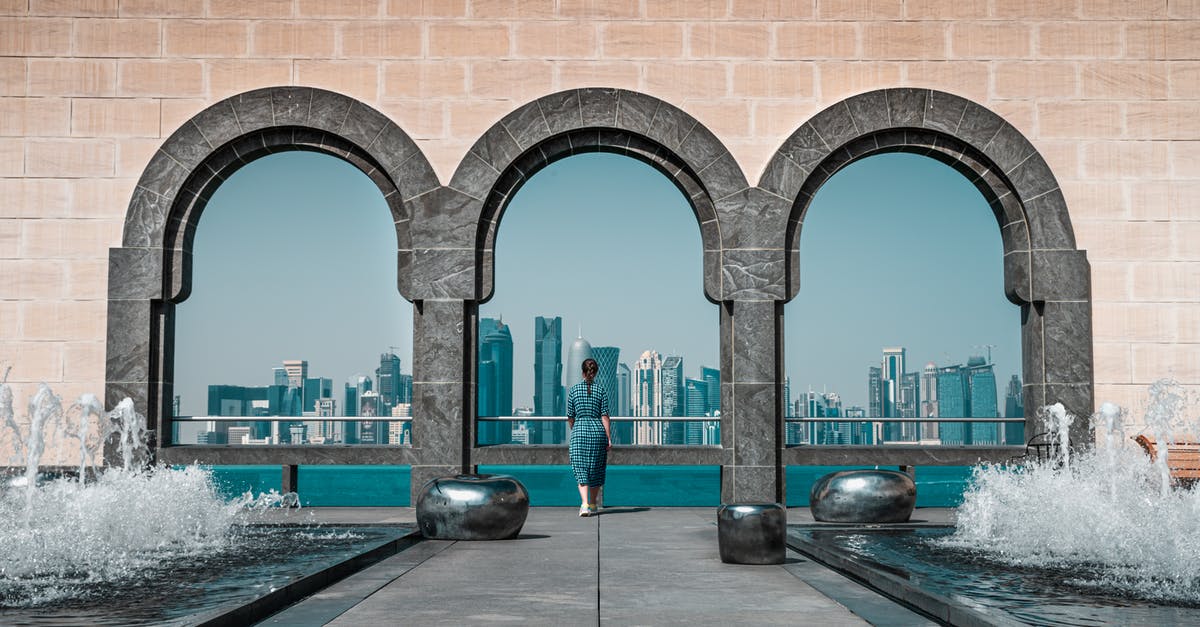 Qatar - Doha - Lounge Options - Brown Building With Stonewall And Arches
