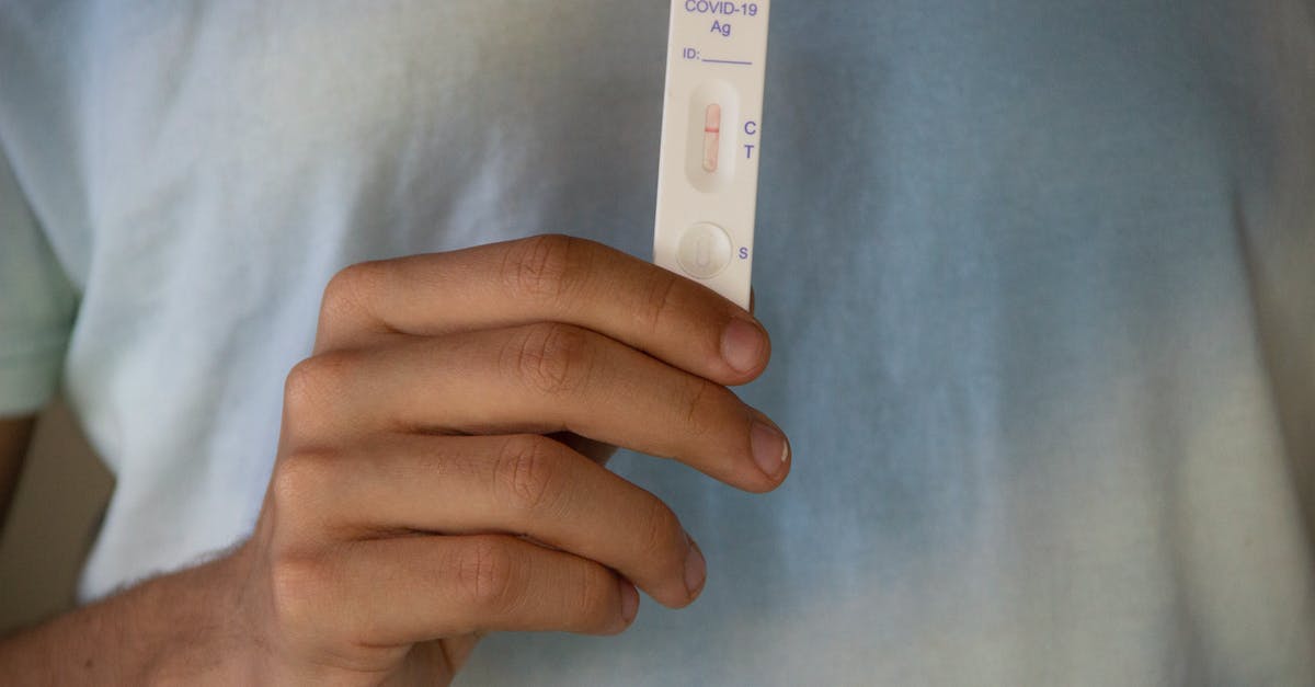 quarantining in the UK pending negative COVID-19 PCR test results - A White Covid Test at Negative Result