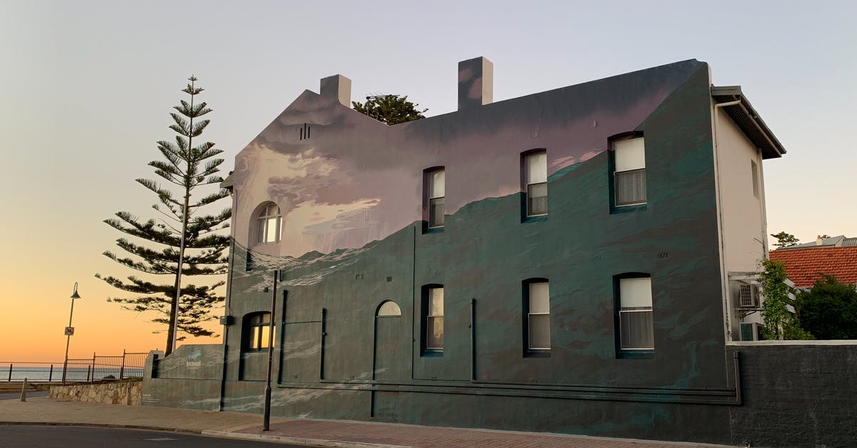 Question about Australia ETA and before enter to Australia - Gray and Green Concrete Building Near Road