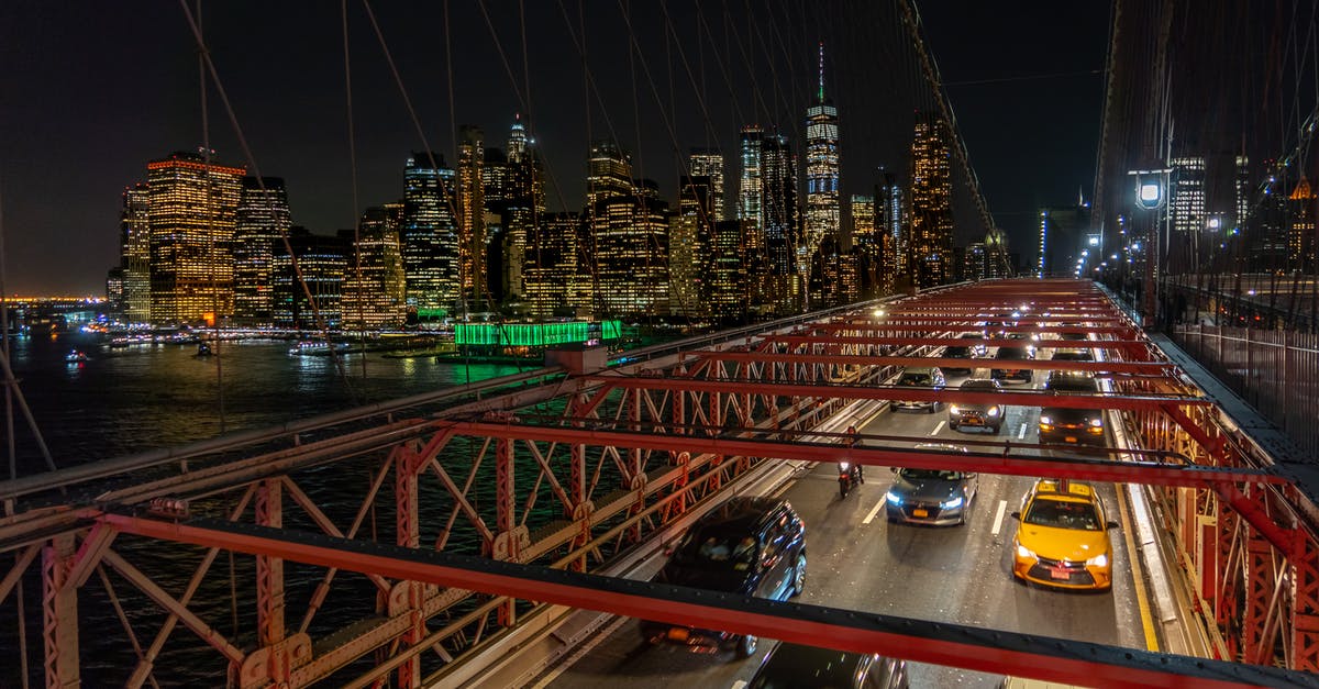 Question on minimum age for rental cars in USA - Vehicles Passing by a Bridge during Nighttime