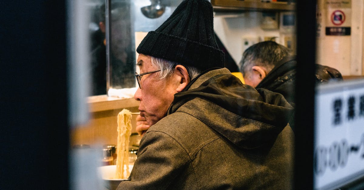 Ramen eating etiquette - Man Eating Noodles