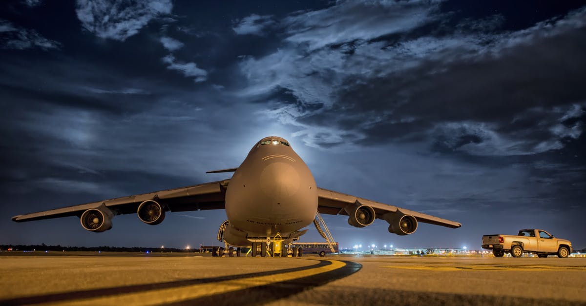 Reaching Rotterdam airport during night hours - Airplane in Front and Night Sky