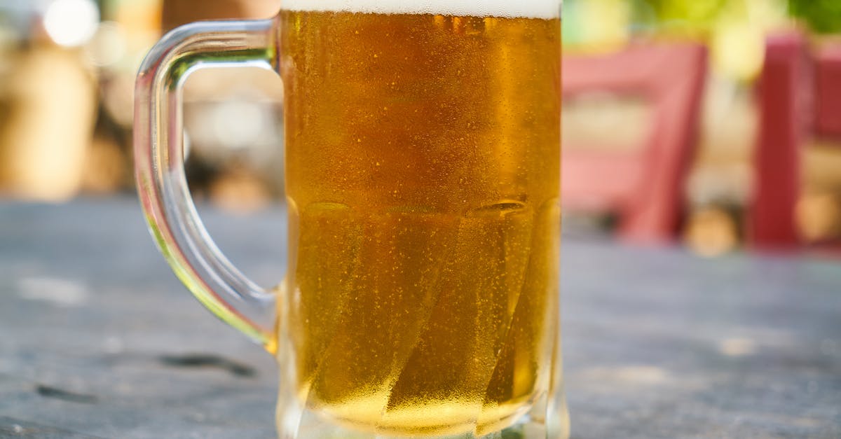 Received gestures in UK pubs: pint versus half-pint - Beer Filled Mug on Table