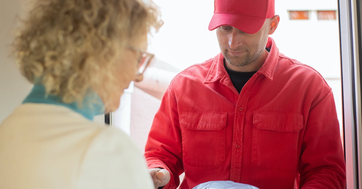 Receiving parcel in Japan [closed] - Delivery Man delivering a Package