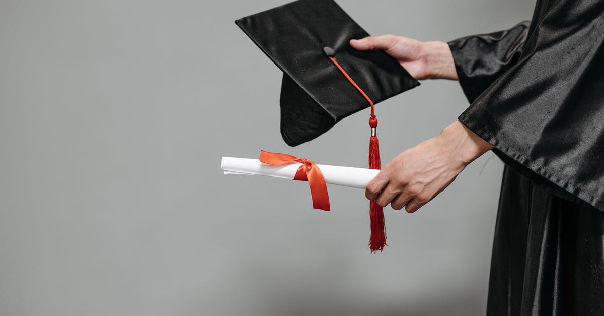 Recognised Graduate visa (subclass 476) and iBT for Australia? [closed] - Photo of Person Holding Graduation Cap and Diploma