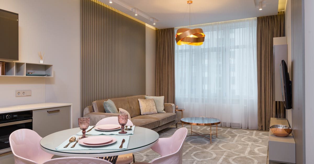 Reentering Schengen Zone with a new stamp - Stylish interior design of living room with dining zone