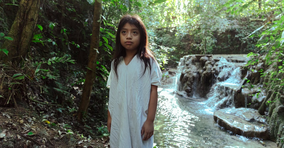 Re-entering USA in the VWP after travelling to Mexico - Photo Of Girl Standing Beside Flowing Stream 