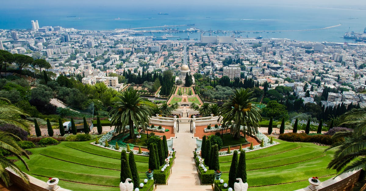 Re-entry into Israel as tourist (Australian citizen) - Panoramic View of Hedge and Raw Houses Across Large Body of Water