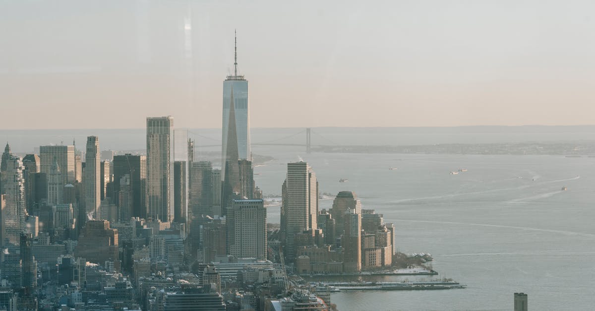 Regarding new possible EU travel limitations of US citizens [duplicate] - Picturesque cityscape of New York under sundown sky