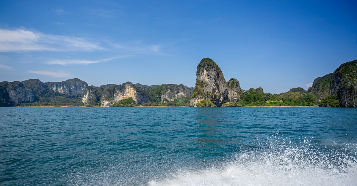 Regarding transit visa for Thailand - Green and Brown Island on Blue Sea Under Blue Sky