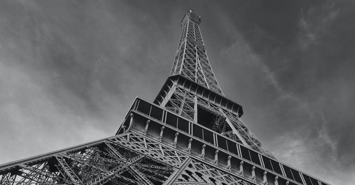 Regarding travel to Germany and France by bus - Grayscale Photo of Eiffel Tower