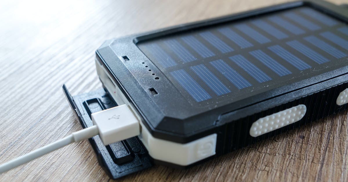 Regulations for traveling with LiPo battery in homemade electronic - Black Solar Power Bank on Brown Surface