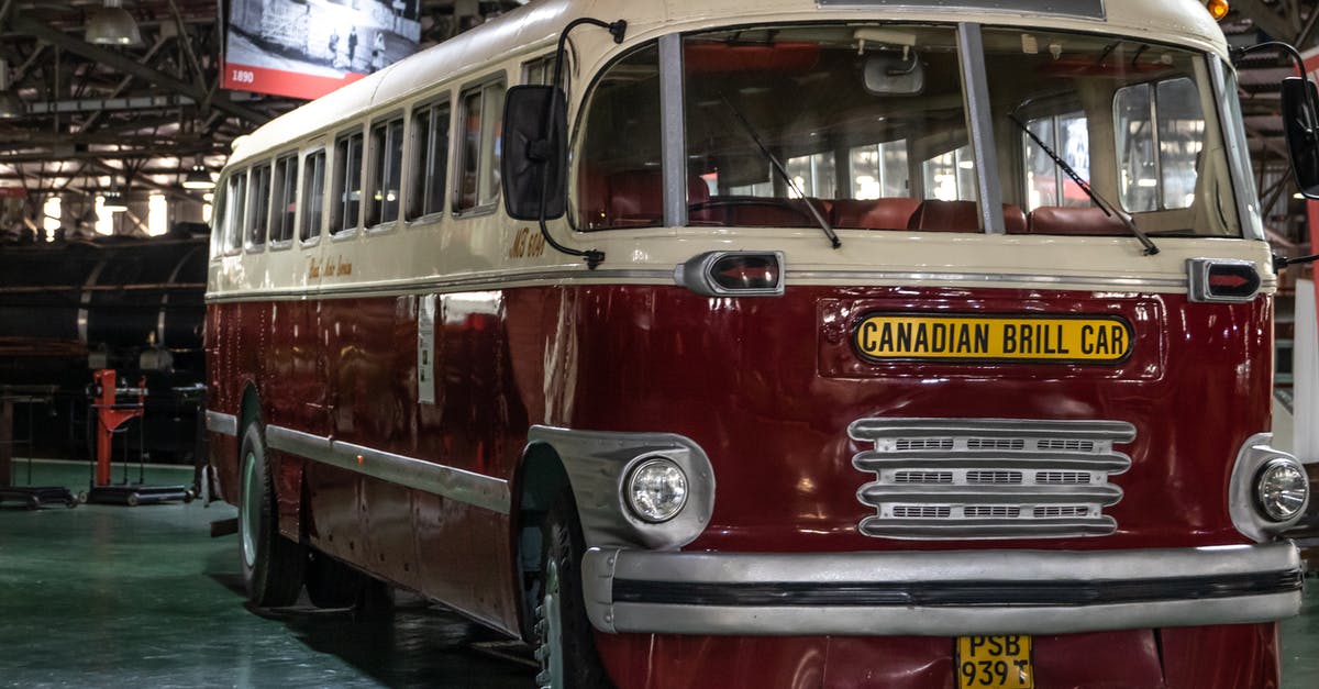 Remedies when bus company makes me miss a flight [closed] - Red and White Bus on Road