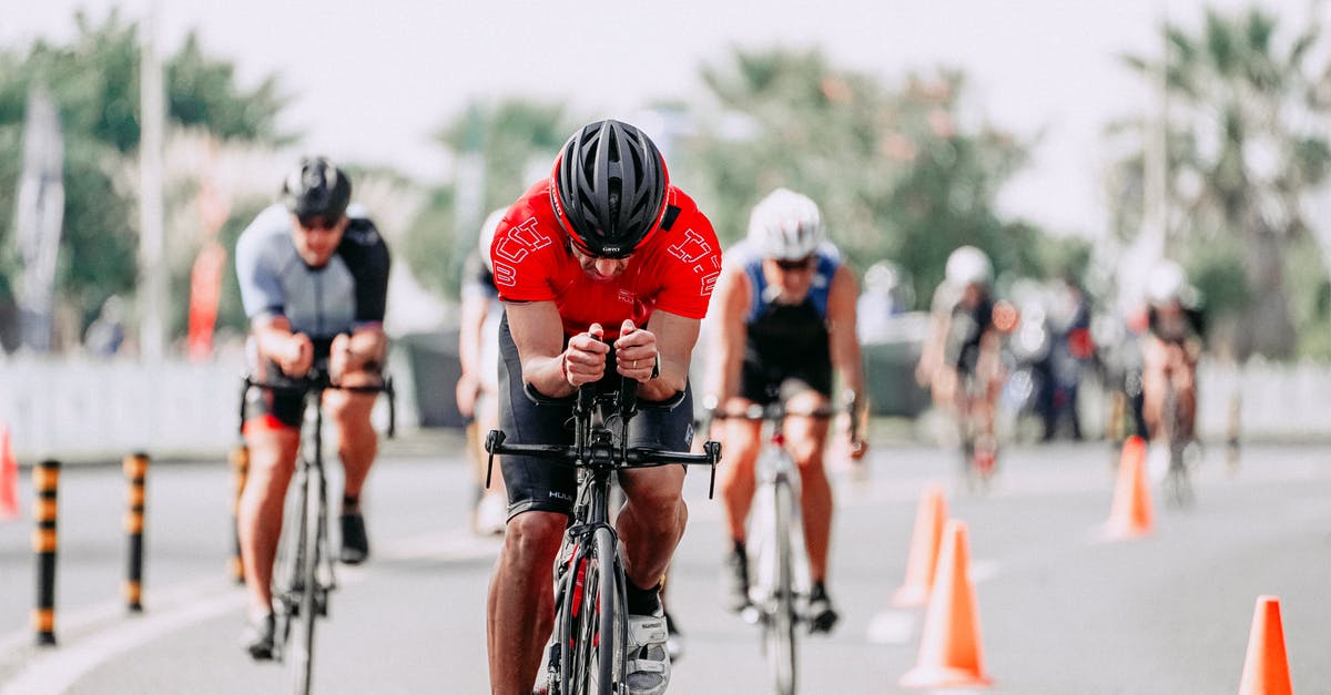 Rent a racing bicycle in the Eifel, Germany - Unrecognizable cyclists riding bikes on road during race