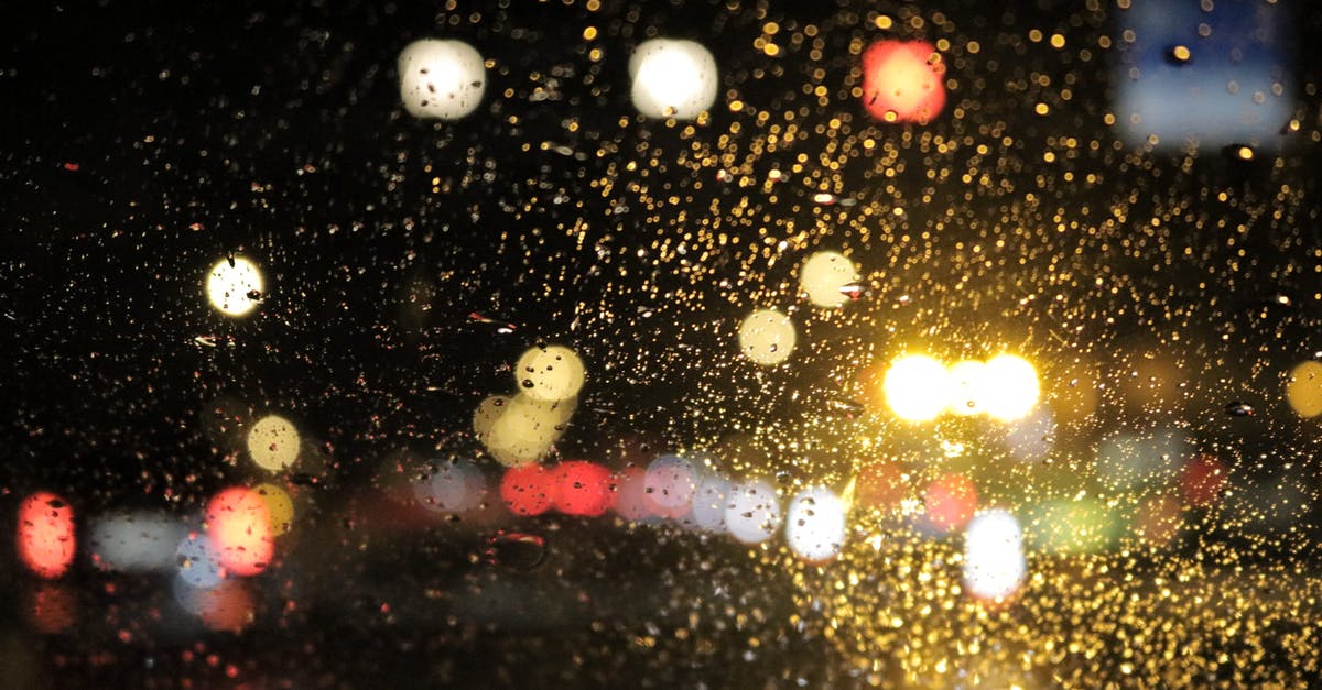 Rent car in Kuala Lumpur, drop off in Singapore? - Selective Focus Photography of Water Drops on Glass