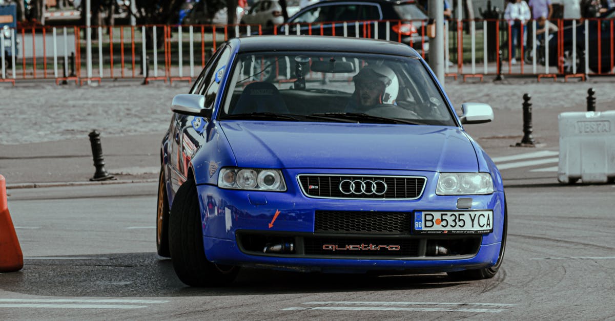 Renting a car in central Asia as an inexperienced driver - Driving race car on city street