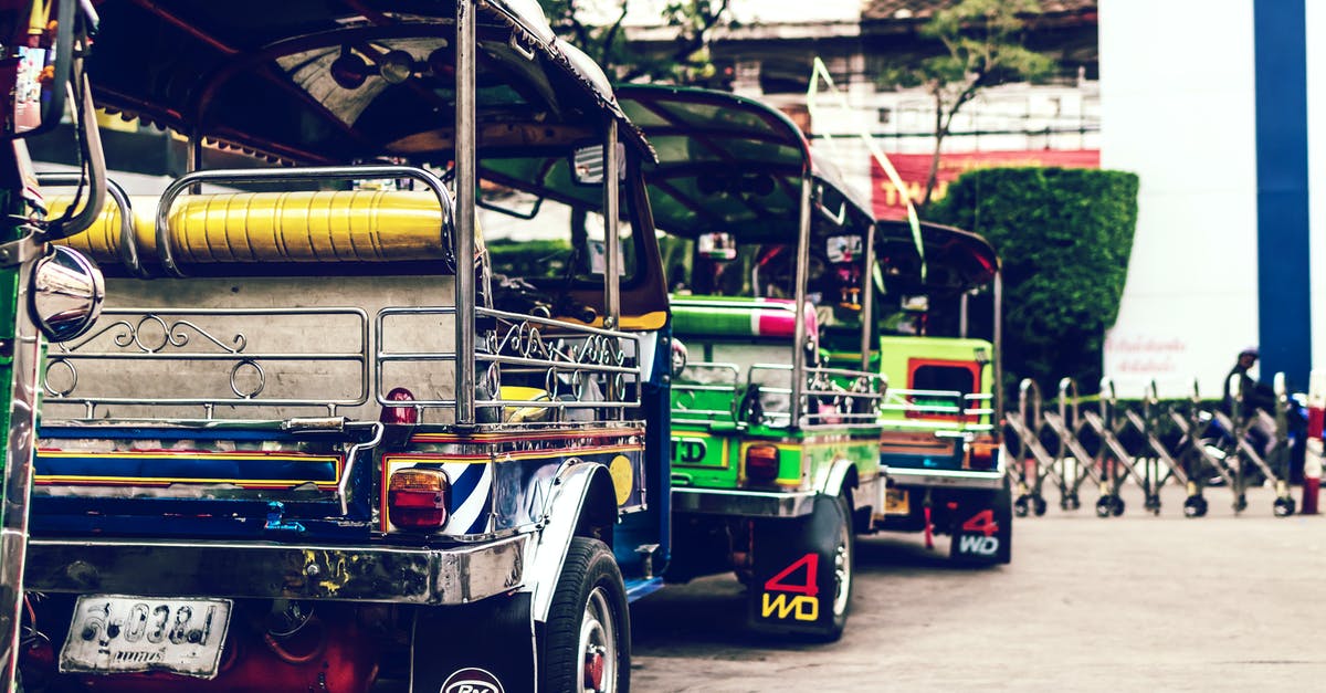 Renting a motorcycle in Thailand - Row of Auto-rickshaw