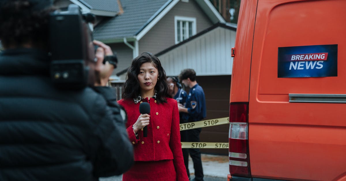 Reporting a cancelled visa - A Woman Reporting Beside The Van 