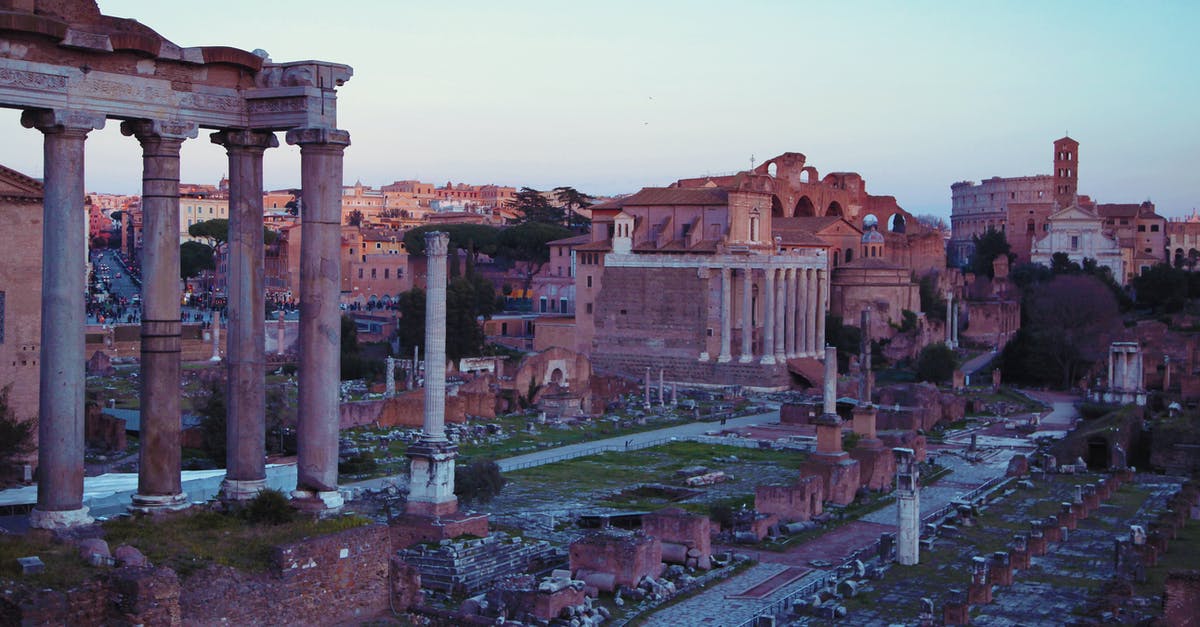 Requirements to visit Italy - Ruins of ancient city under blue sky at sunset